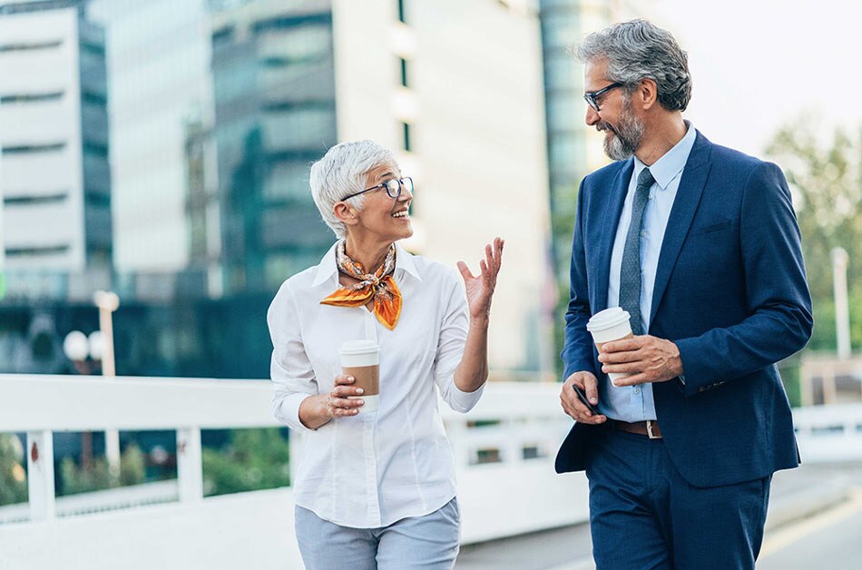 couple discussing finances outside in city